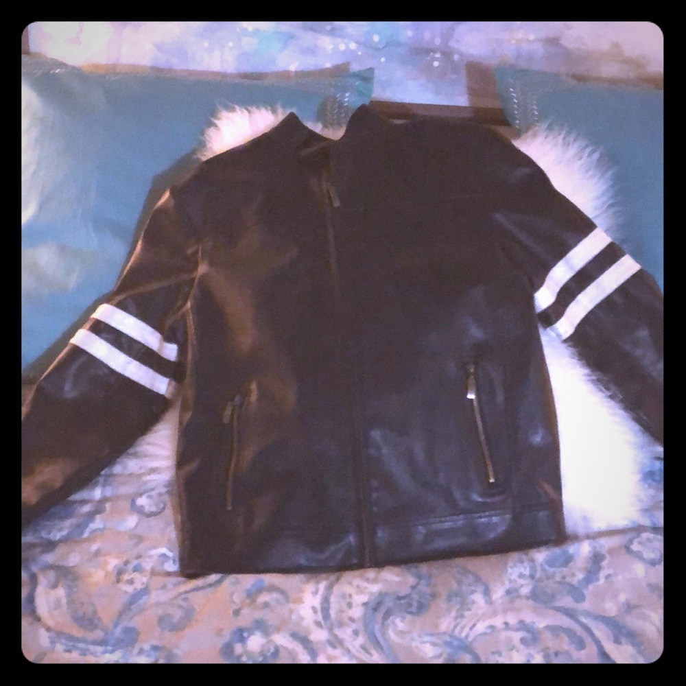 Leather jacket/cross on the back